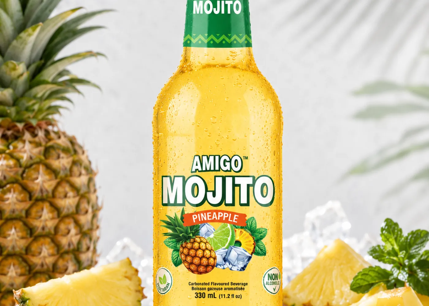 Amigo Mojito Pineapple bottle with fresh pineapple, lime and mint.